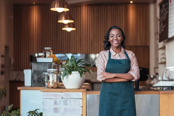 Entrepreneur standing in cafe — Stock Photo, Image