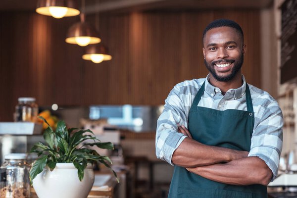 entrepreneur standing in cafe 