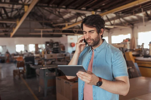 Young Carpenter Beard Standing His Large Woodworking Shop Talking Cellphone — Stock Photo, Image