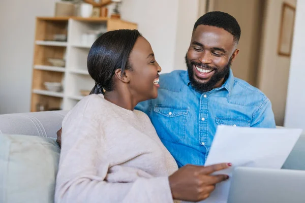 Laughing Young African American Couple Sitting Living Room Sofa Together — Stock Photo, Image