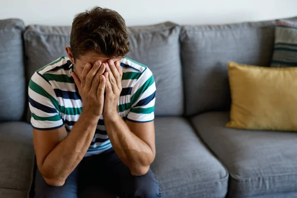 Distraught Young Man Sitting Alone His Living Room Sofa Home — Stock Photo, Image