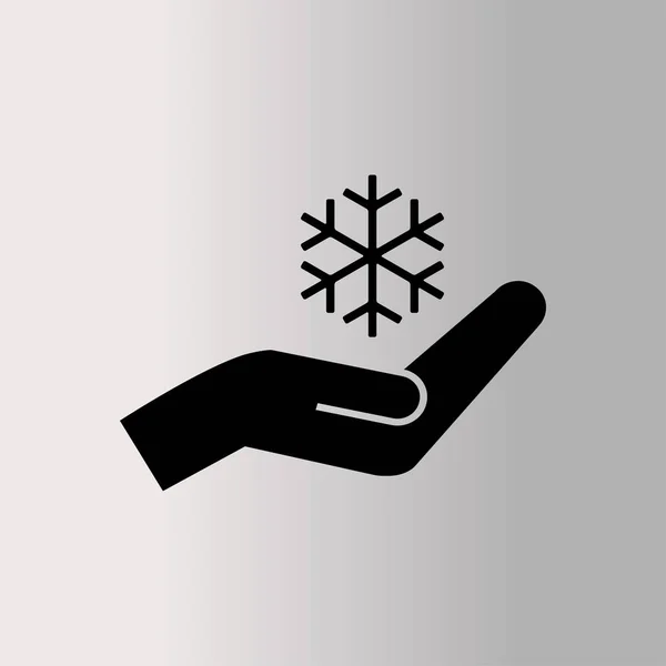 Floco de neve e ícone de mão — Vetor de Stock