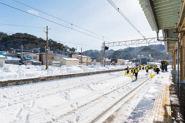 Railway workers in winter