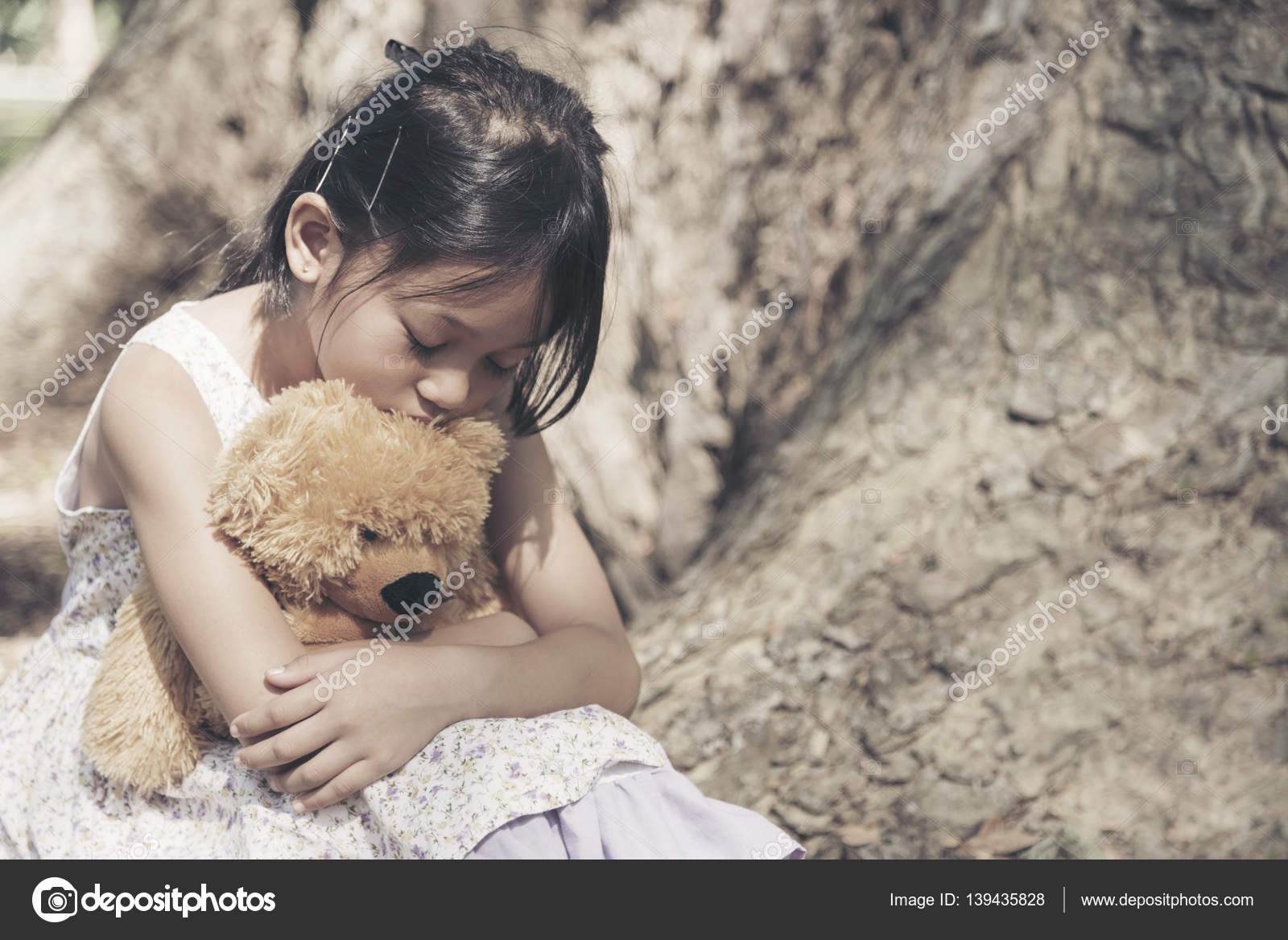 Sad girl feeling alone in the park. Stock Photo by ©howtogoto ...