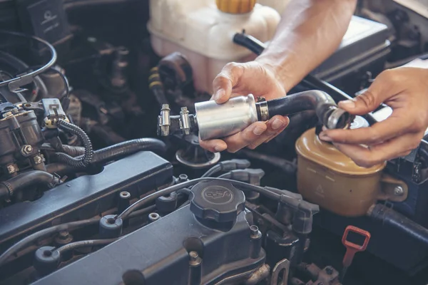 Mechanic Car Service in automobile garage auto car and vehicles service mechanical engineering. Automobile mechanic hands car repairs automotive technician workshop center. Services car engine machine