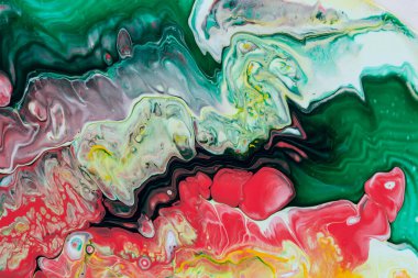 Kırmızı ve yeşil tonlarda akrilik boyanın soyut arkaplanı