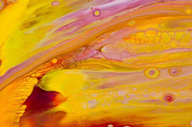 Kırmızı ve sarı tonlarda akrilik boyanın soyut arkaplanı