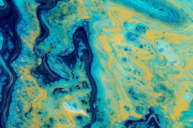 Mavi ve sarı tonlarda akrilik boyanın soyut arkaplanı