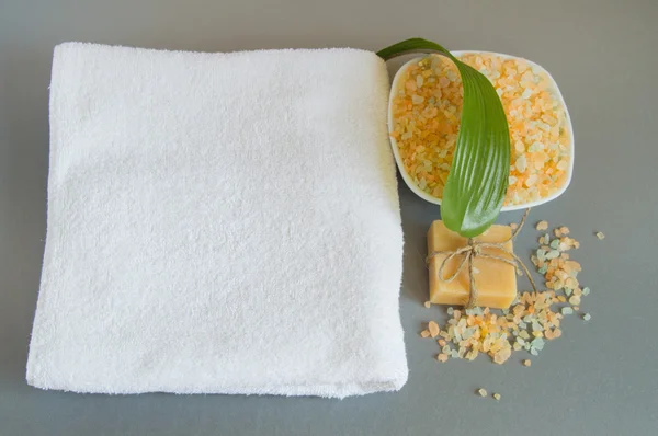 Handmade soap, a white towel, sea salt for body care — Stock Photo, Image