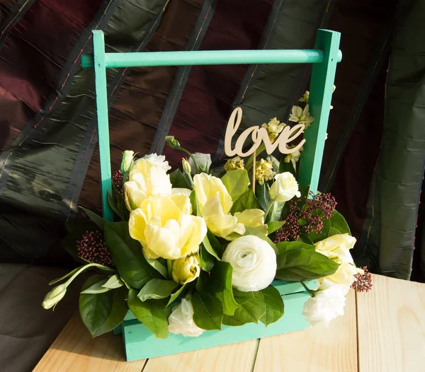 Spring flowers in wooden box and topper Love, Valentines Day, wedding