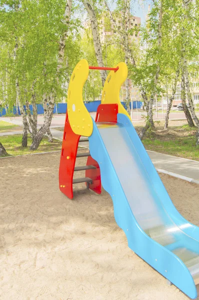 Colorful childrens slide at the Playground in Park — Stock Photo, Image