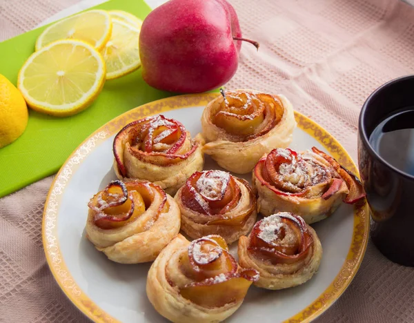 Homemade muffins with Apple, cinnamon, icing sugar on a plate — Stock Photo, Image