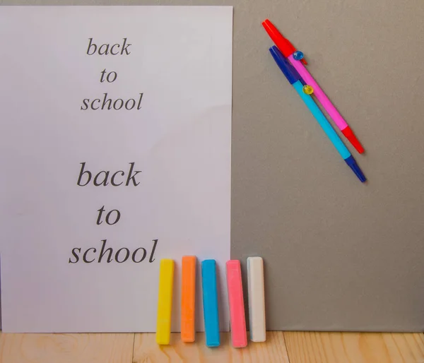 Back to school concept, a pen, Notepad, chalk — Stock Photo, Image