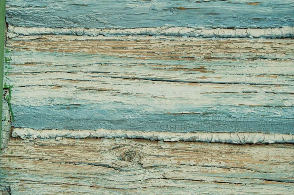 Vieilles planches horizontales, peinture ancienne et épluchante au fil du temps, peinture bleue épluchant de vieilles planches et texture du bois fissurée, fond grunge abstrait — Photo