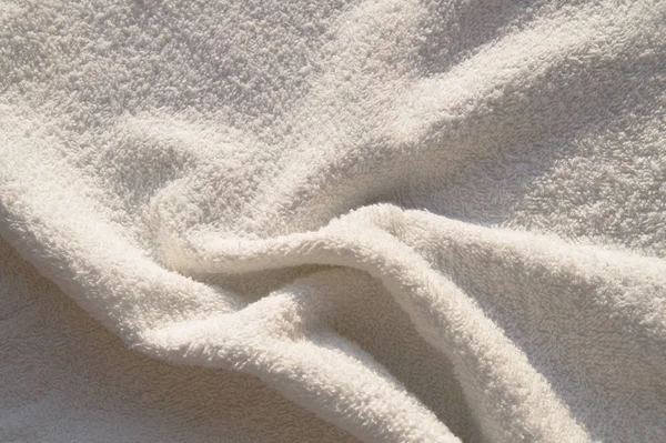 Textura fundo branco Terry toalha em luz solar brilhante — Fotografia de Stock