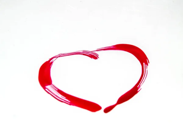 Close up czerwony serce kształt paznokci polski znak izolowany na białym tle, koncepcja Walentynki i makijaż — Zdjęcie stockowe