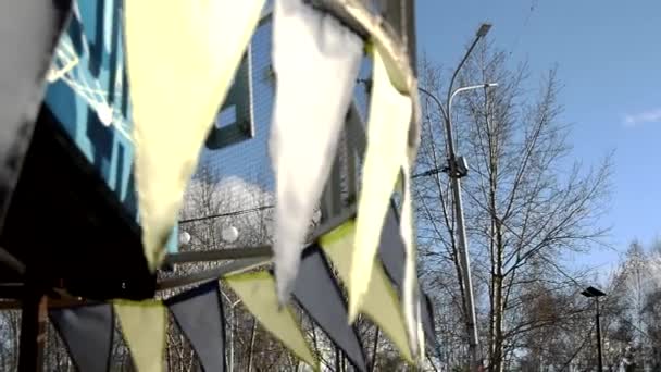 Carnival Decoration Close Selective Focus Wind Slapping Garlands Multicolored Flags — Stockvideo