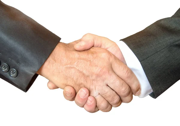 白い背景に隔離されたビジネススーツの2人のビジネスマンの間のビジネス握手のクローズアップ — ストック写真