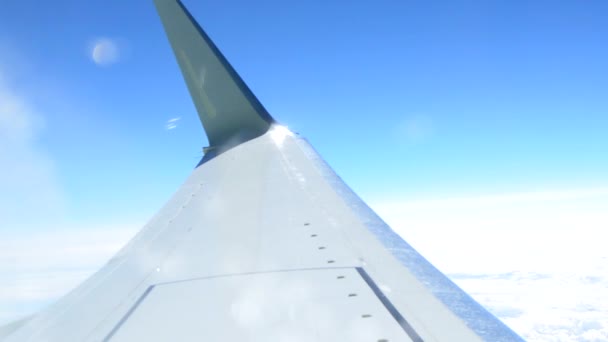 View Window Plane Wing Plane Flying Clouds Bright Sun Glare — Stock Video