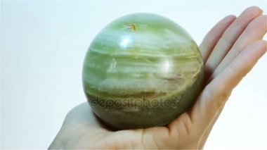 Mermer Onyx top. Siyah Oniks tutan el.