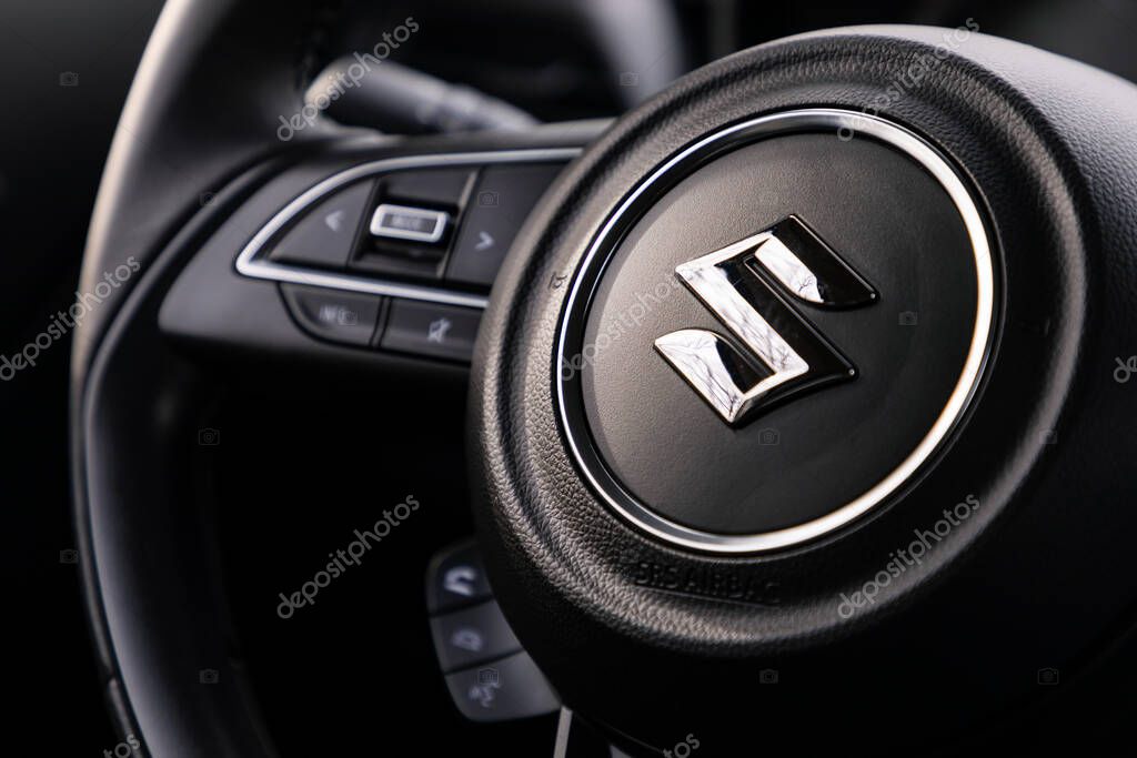 PRAGUE, CZECH REPUBLIC - FEBRUARY 13, 2020: Logo of Suzuki vehicle in Prague, Czech Republic, February 13, 2020