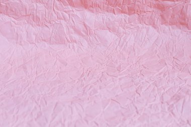 Pembe buruşuk ambalaj kağıdının arka planı. Tebrik bayrağı, kart.