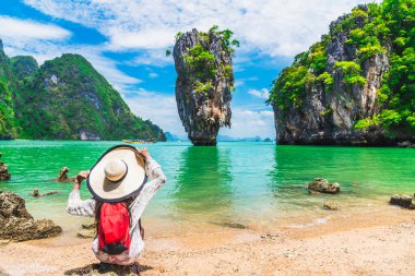 Stunning amazed nature scenic landscape with traveler woman on b