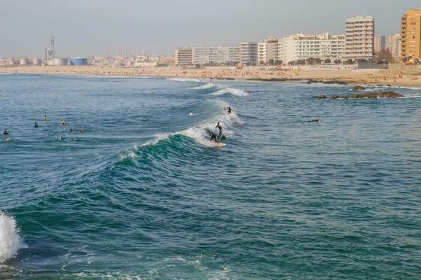 Surfers at ocean, Portugal, Porto. Travel photo. — Stock Photo, Image