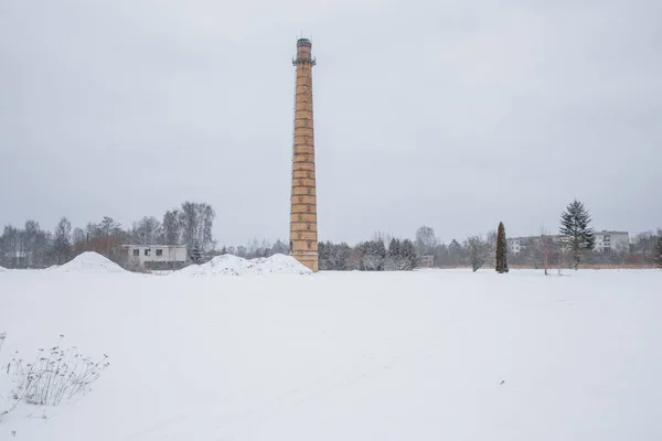 Urban city photo at Latvia, old tower. Winter, snow and building — Stock Photo, Image