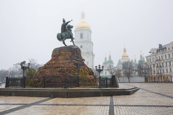 City, Kiev, Ukraine. City square in the morning mist with monume
