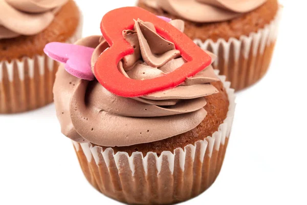 Cupcakes con crema decorada con corazón — Foto de Stock