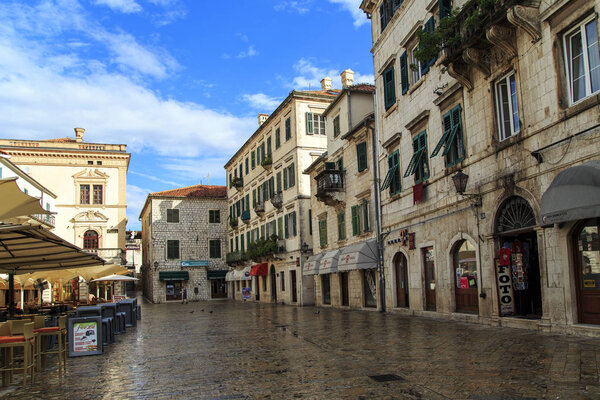 KOTOR, MONTENEGRO - SEPTEMBER 13, 2013: Square of the Arms is the main square of the ancient city, which is listed in the UNESCO World Heritage List.