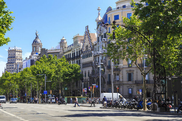 BATCELONA, SPAIN - MAY 12, 2017: This is Passeig de Gracia, which is located in the Eixample district and is one of the most important and famous streets of the city.