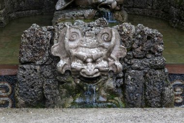 SALZBURG, AUSTRIA - MAY 21, 2019: This is a fragment of one of the park fountains of the Helbrunn Palace and Park complex.