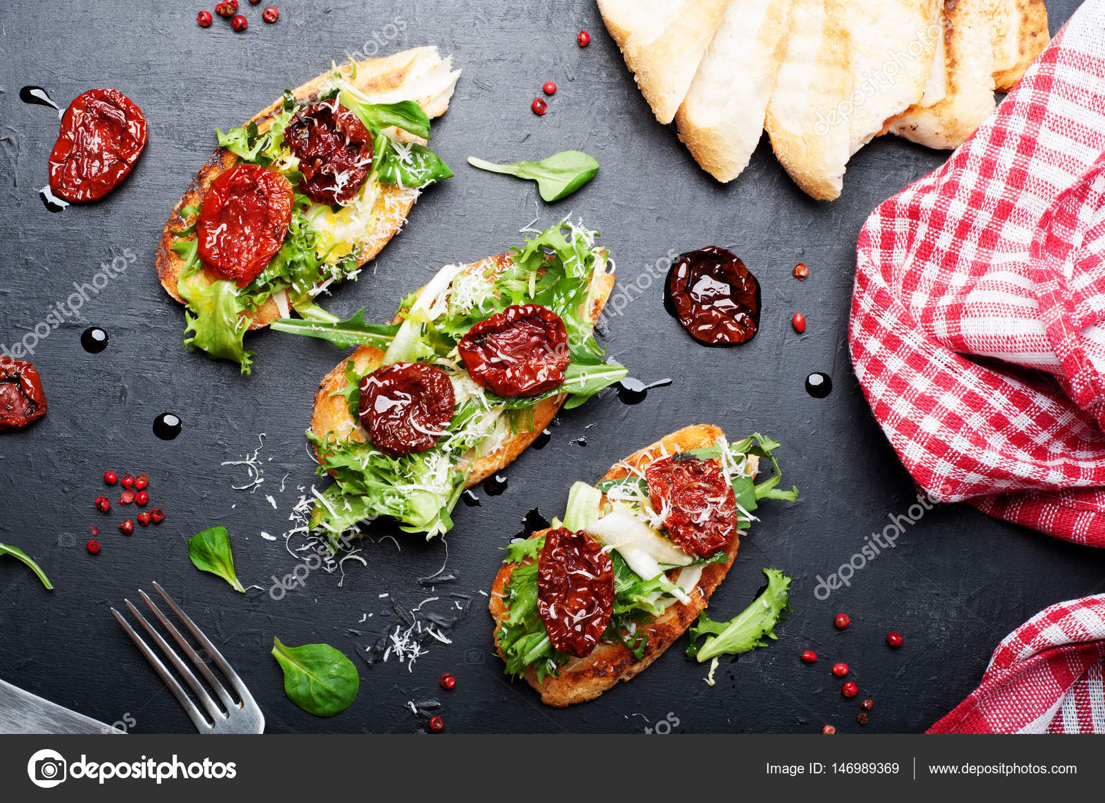Bruschetta' (sandwich) with toast, mix of Italian herbs (iceberg