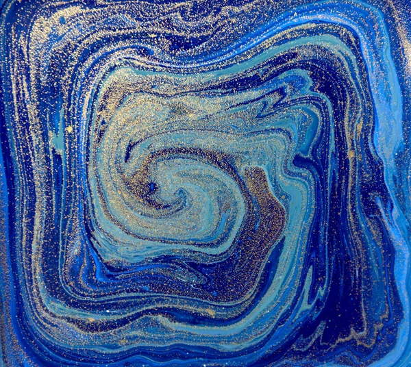 Blue and gold liquid texture. Hand drawn marbling background. Ink marble abstract pattern