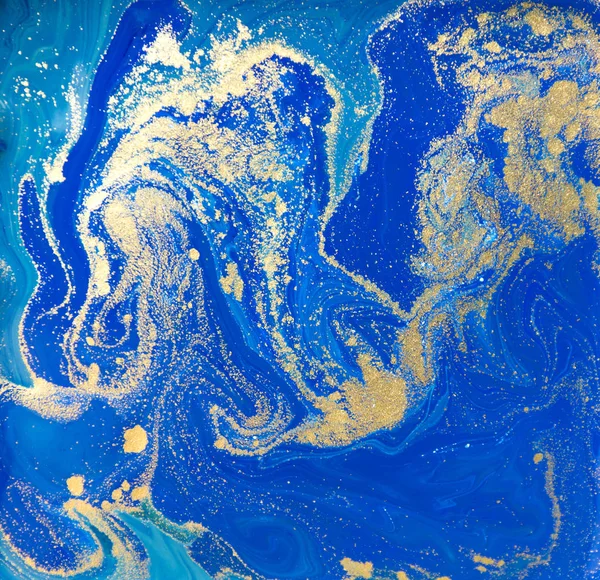 Blue and gold liquid texture. Hand drawn marbling background. Ink marble abstract pattern