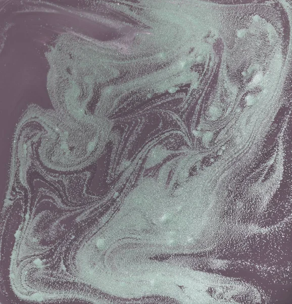 Liquid gold marbled pattern. Pale purple background