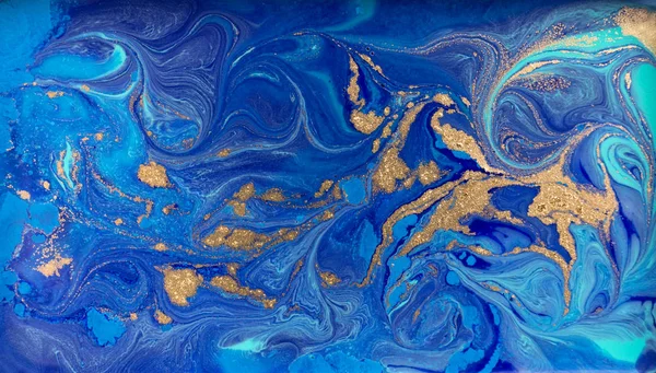 Marbled blue and gold abstract background. Liquid marble pattern.