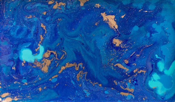 Marbled blue and gold abstract background. Liquid marble pattern.