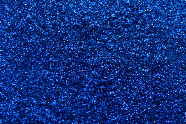 Blue sparkle background. Night glitter texture.
