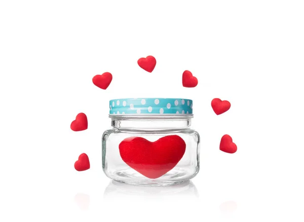 Red felt heart in glass jar with blue poka dot lid — Stock Photo, Image