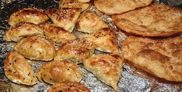 Uzbek national dish samsa, fried dough, puff pastry. Uzbek cuisi