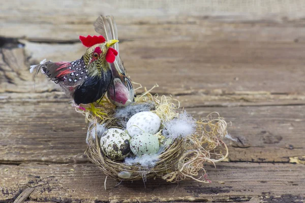 Easter decoration -  eggs in nest and birds — Stock Photo, Image