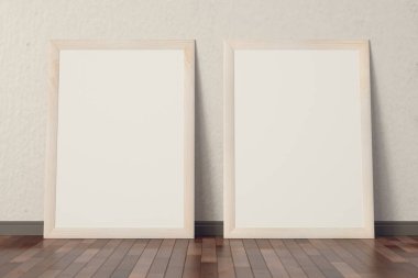 Ahşap bir çerçeve ile iki posterler