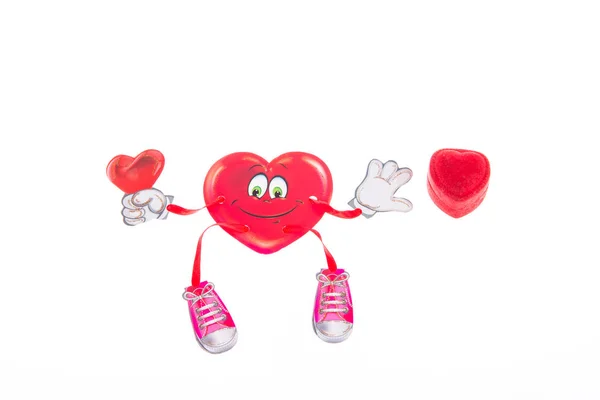 Soft toy strapped clothespins hanging heart on Valentine's Day — Stock Photo, Image