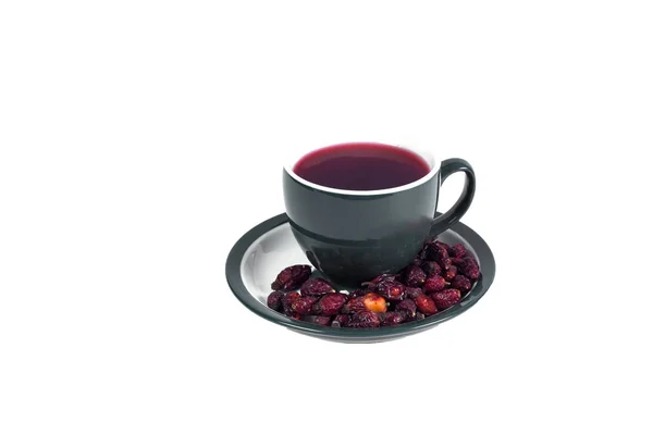Una taza de té caliente de rosa mosqueta vitamina caliente invierno y curar los resfriados . — Foto de Stock