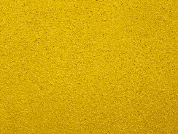 Concrete wall in bright yellow color — Stock Photo, Image