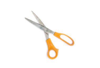 beyaz zemin üzerine sarı makas.