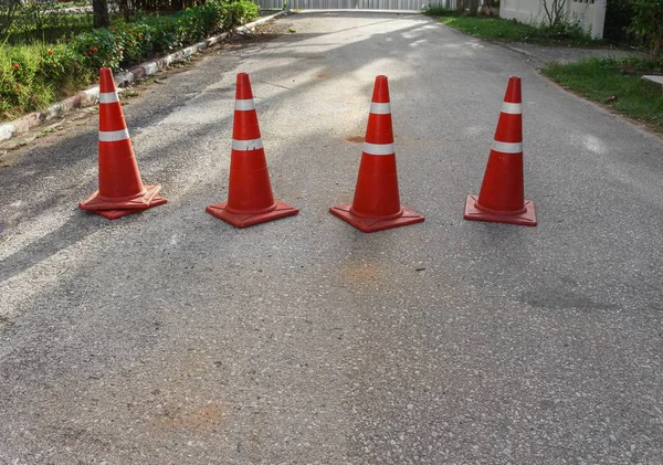 Road with the traffic cone. Row  traffic cone white and orange